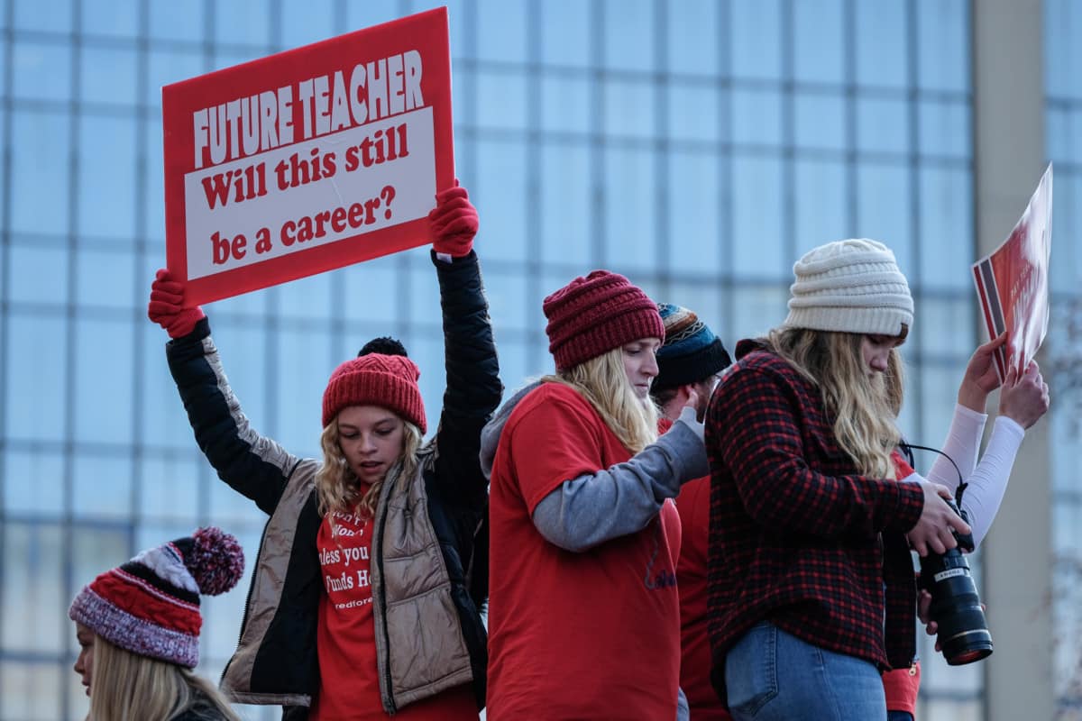 Public education supporters gather at the Statehouse for the Red for Ed Action Day rally in downtown Indianapolis, Tuesday, Nov. 19, 2019. Mike Wolanin | The Republic