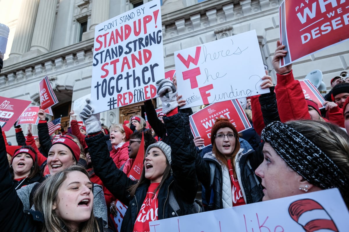 Public education supporters gather at the Statehouse for the Red for Ed Action Day rally in downtown Indianapolis, Tuesday, Nov. 19, 2019. Mike Wolanin | The Republic