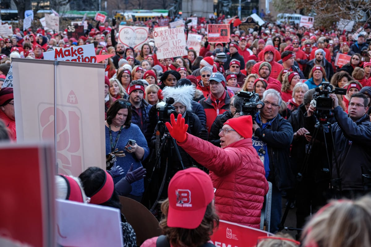 Keith Gambill, president of the Indiana State Teachers Association, addresses public education supporters during the Red for Ed Action Day rally at the Statehouse in downtown Indianapolis, Nov. 19, 2019. Mike Wolanin | The Republic