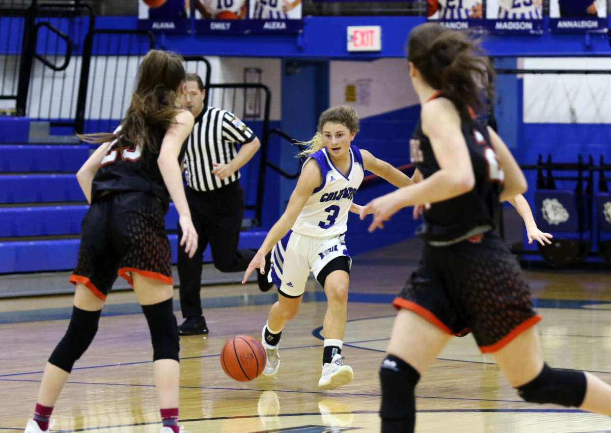 Columbus North's Lauren Barker brings the ball down the court against Lawrenceburg at Columbus North, Saturday, Jan. 16, 2021. Paige Grider for The Republic