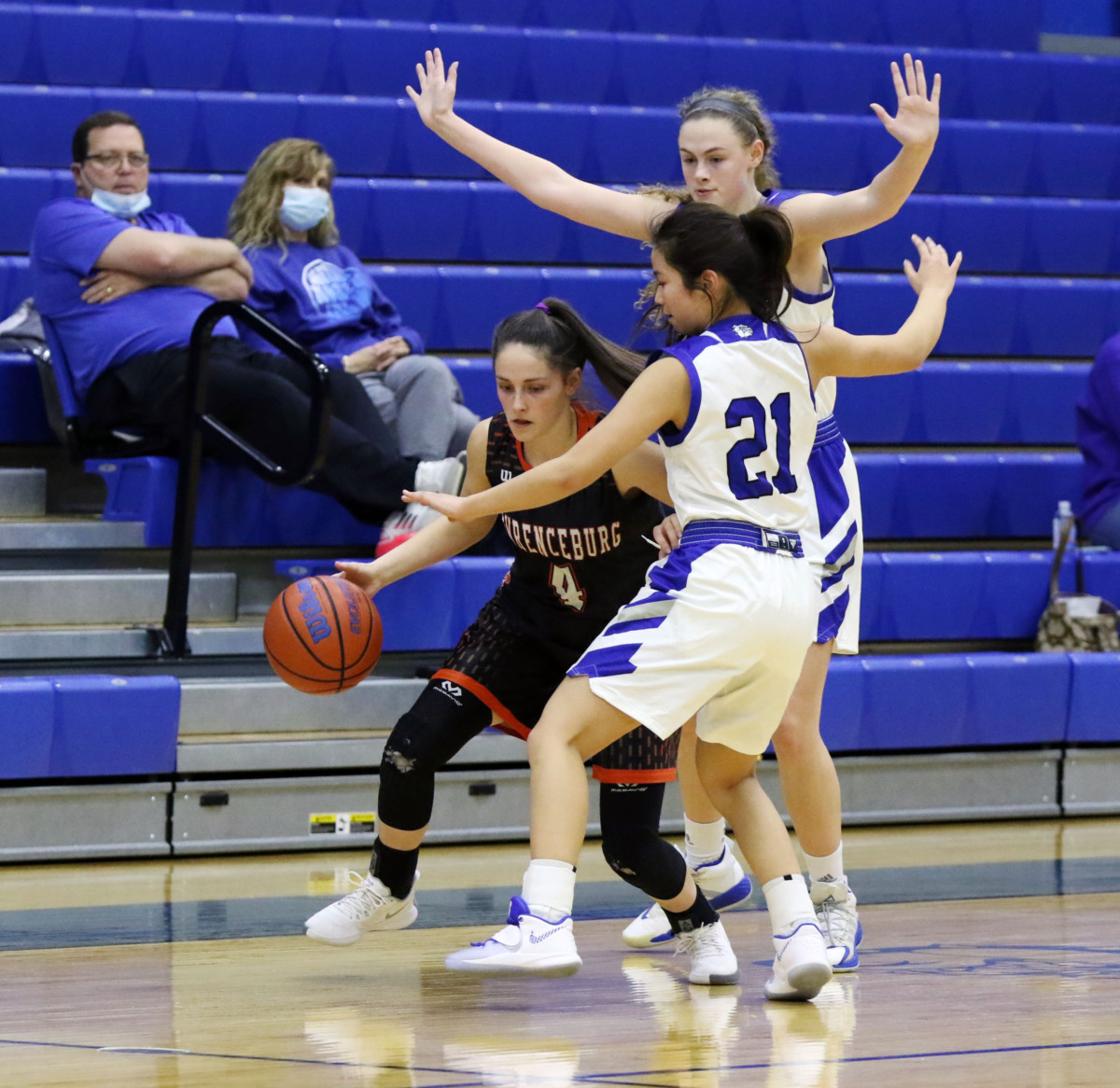 Columbus North's Kanon Matsuno and Madison White guard Lawrenceburg's Holly Knippenberg at Columbus North, Saturday, Jan. 16, 2021. Paige Grider for The Republic