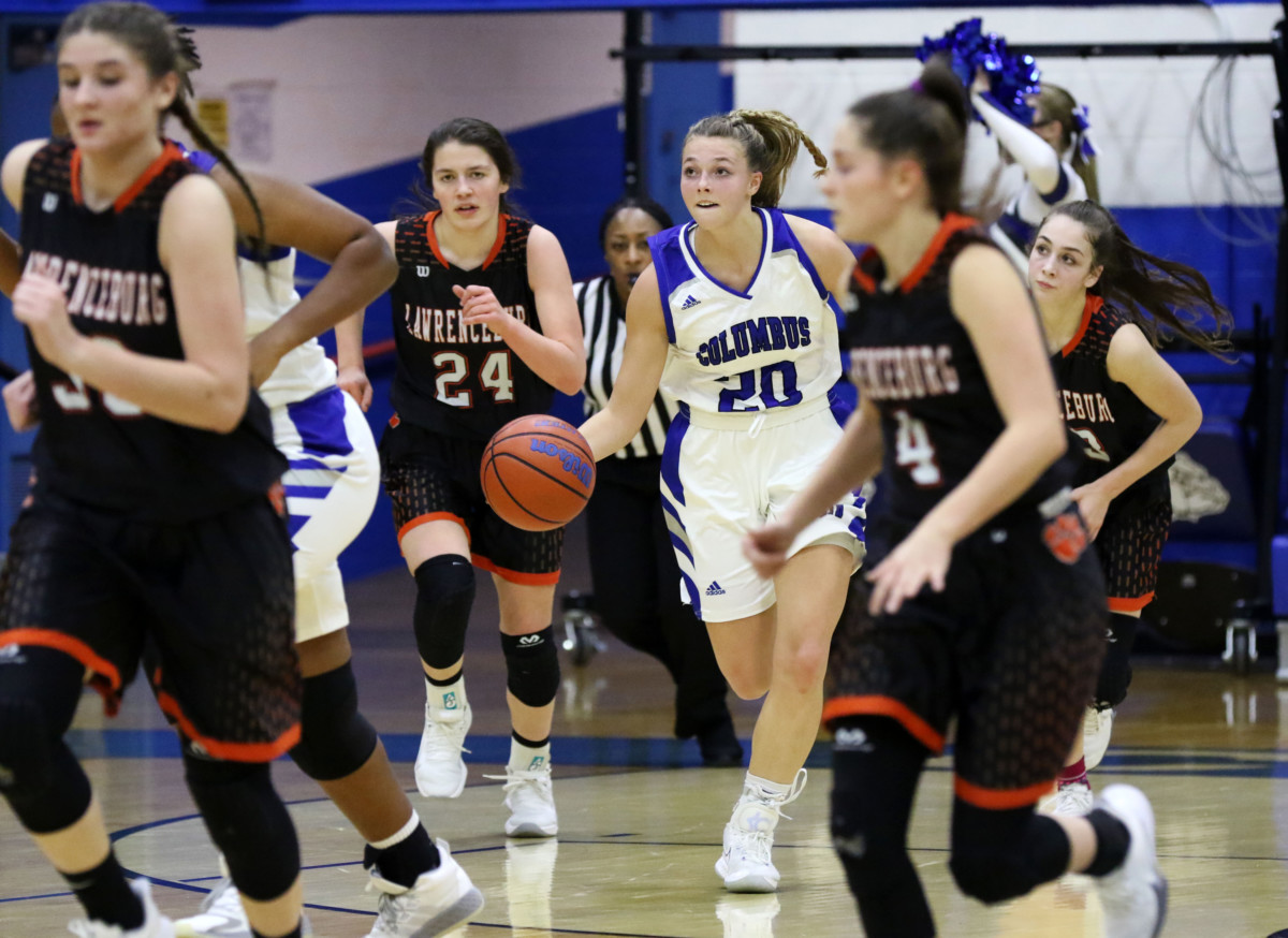 Columbus North's Alexa McKinley brings the ball down the court against Lawrenceberg at Columbus North, Saturday, Jan. 16, 2021. Paige Grider for The Republic