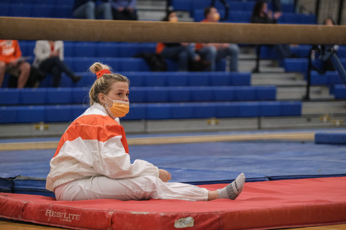 Columbus East's Taylen Lane waits to keep score during a gymnastics meet between Columbus East and Columbus North at Columbus North High School in Columbus, Ind., Monday, Jan. 11, 2021. Lane missed the entire regular season due to concussion like symptoms.