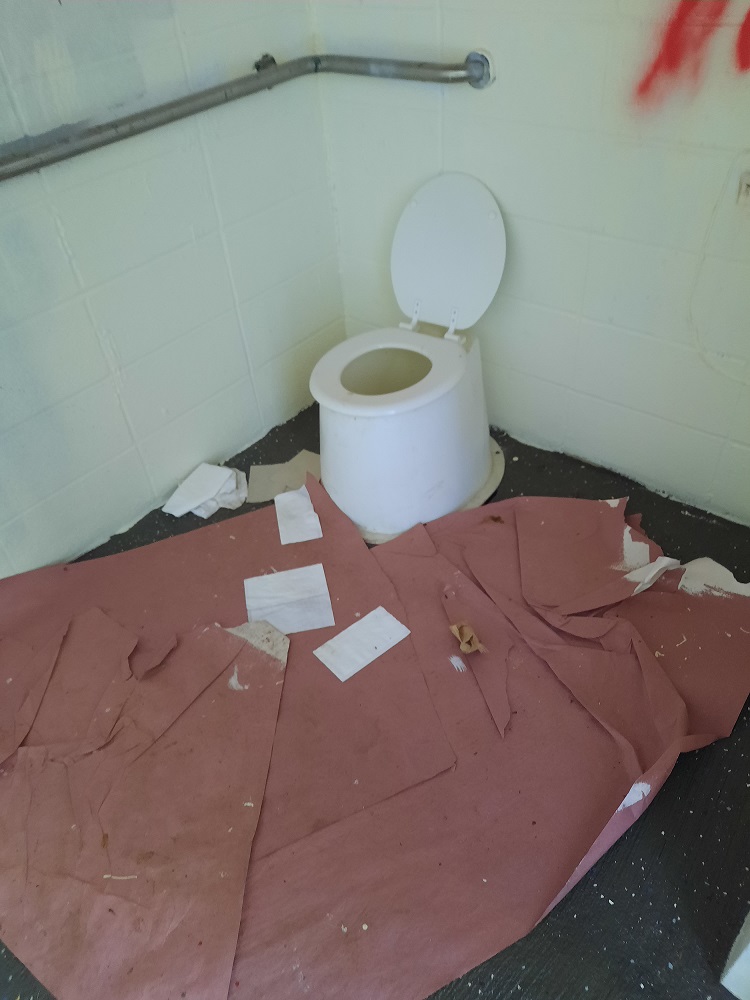 Red spray paint was used on walls and renovation materials scattered after vandalism at the newly-renovated Anderson Falls bathrooms, which had not yet been opened and were still being completed. Photo provided