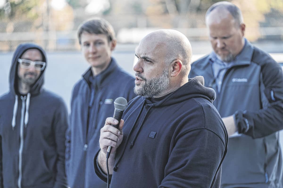 Jonathan Nesci, a Jolie Crider Memorial Skatepark 2.0 committee member, talks about how the new skatepark was built during the ribbon cutting ceremony at the Jolie Crider Memorial Skatepark 2.0 in Columbus, Ind., Friday, Nov. 1, 2019. Columbus City officials and members of the skatepark committee held the ceremony to officially open the redesigned and remodeled park. The original skatepark was built in 1999. Mike Wolanin | The Republic