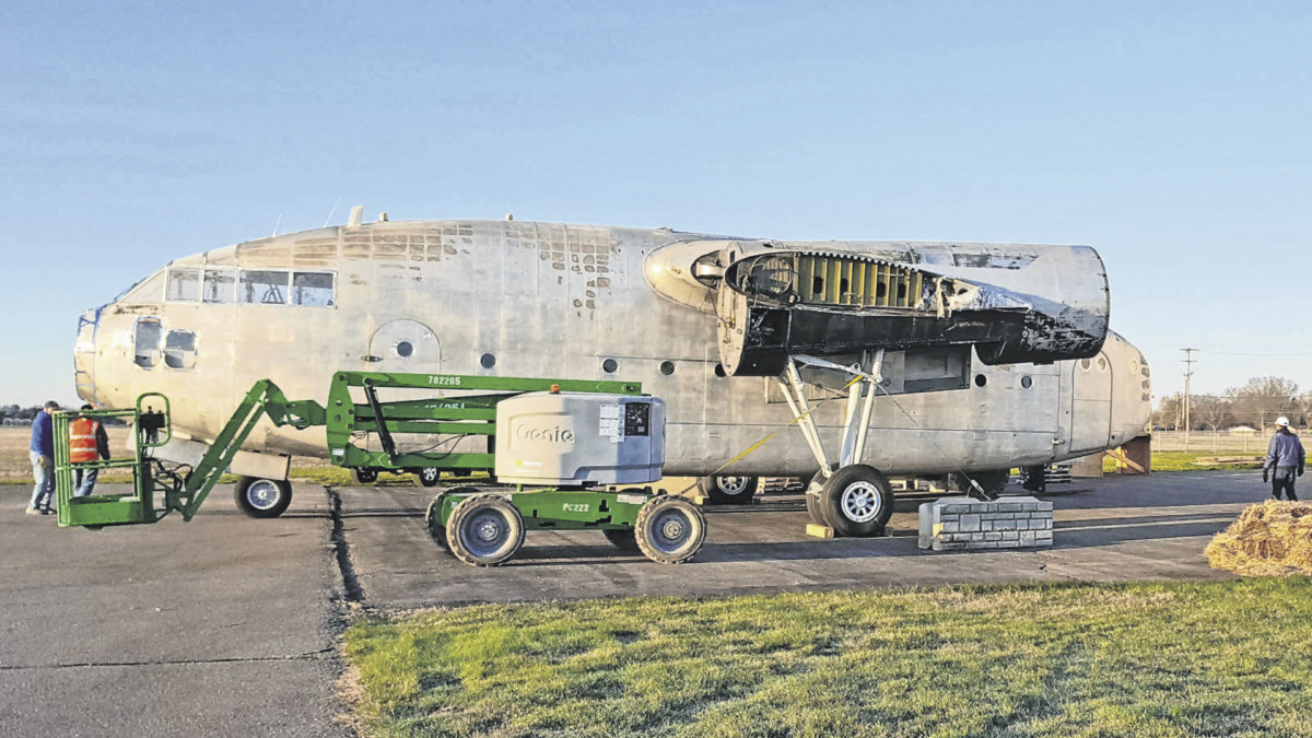 Progress is shown on the C-119 "Flying Boxcar" being reassembled at the Columbus Municipal Airport. Photo provided