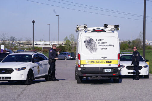 A crime scene vehicle arives where multiple people were shot at the FedEx Ground facility early Friday morning, April 16, 2021, in Indianapolis. A gunman killed eight people and wounded several others before apparently taking his own life in a late-night attack at a FedEx facility near the Indianapolis airport, police said, in the latest in a spate of mass shootings in the United States after a relative lull during the pandemic. (AP Photo/Michael Conroy)