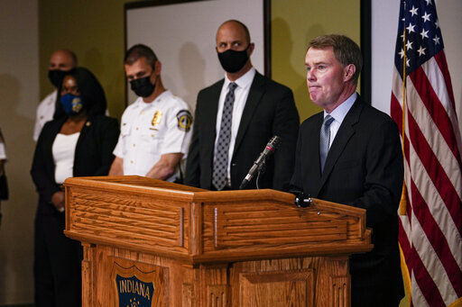 Indianapolis Mayor Joe Hogsett speaks at a news conference following a shooting at a FedEx facility in Indianapolis, Friday, April 16, 2021. A gunman killed several people and wounded others before taking his own life in a late-night attack at a FedEx facility near the Indianapolis airport, police said. (AP Photo/Michael Conroy)