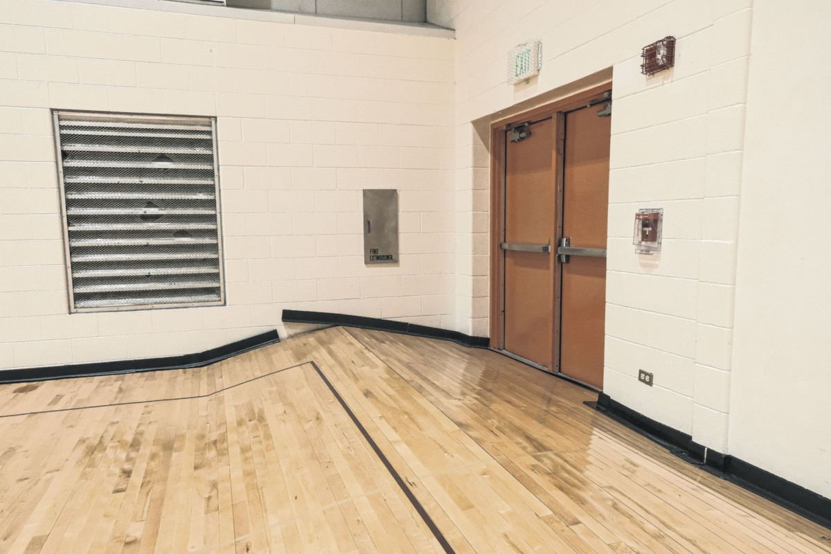 Damage caused by flooding is visible in the auxiliary gym at Columbus East High School in Columbus, Ind., Monday, June 21, 2021. The damage was caused by flooding from the thunderstorms and heavy rain over the weekend. Mike Wolanin | The Republic