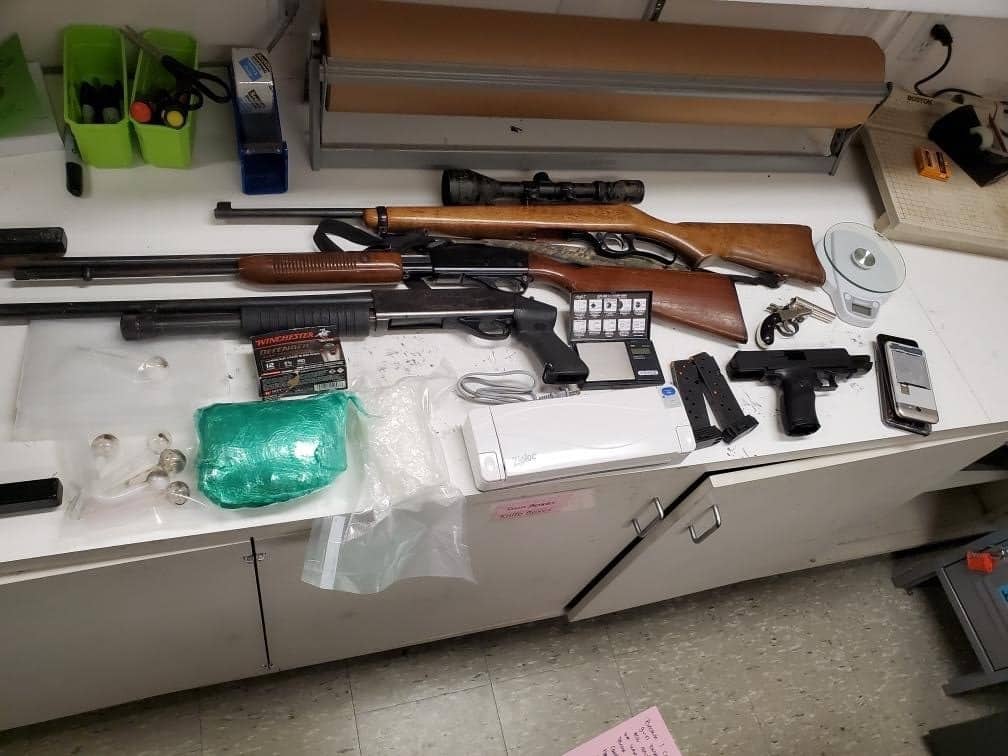 Six firearms were recovered from a home in the 2700 block of Maize Drive where nearly 2 pounds of methamphetamine was also found.