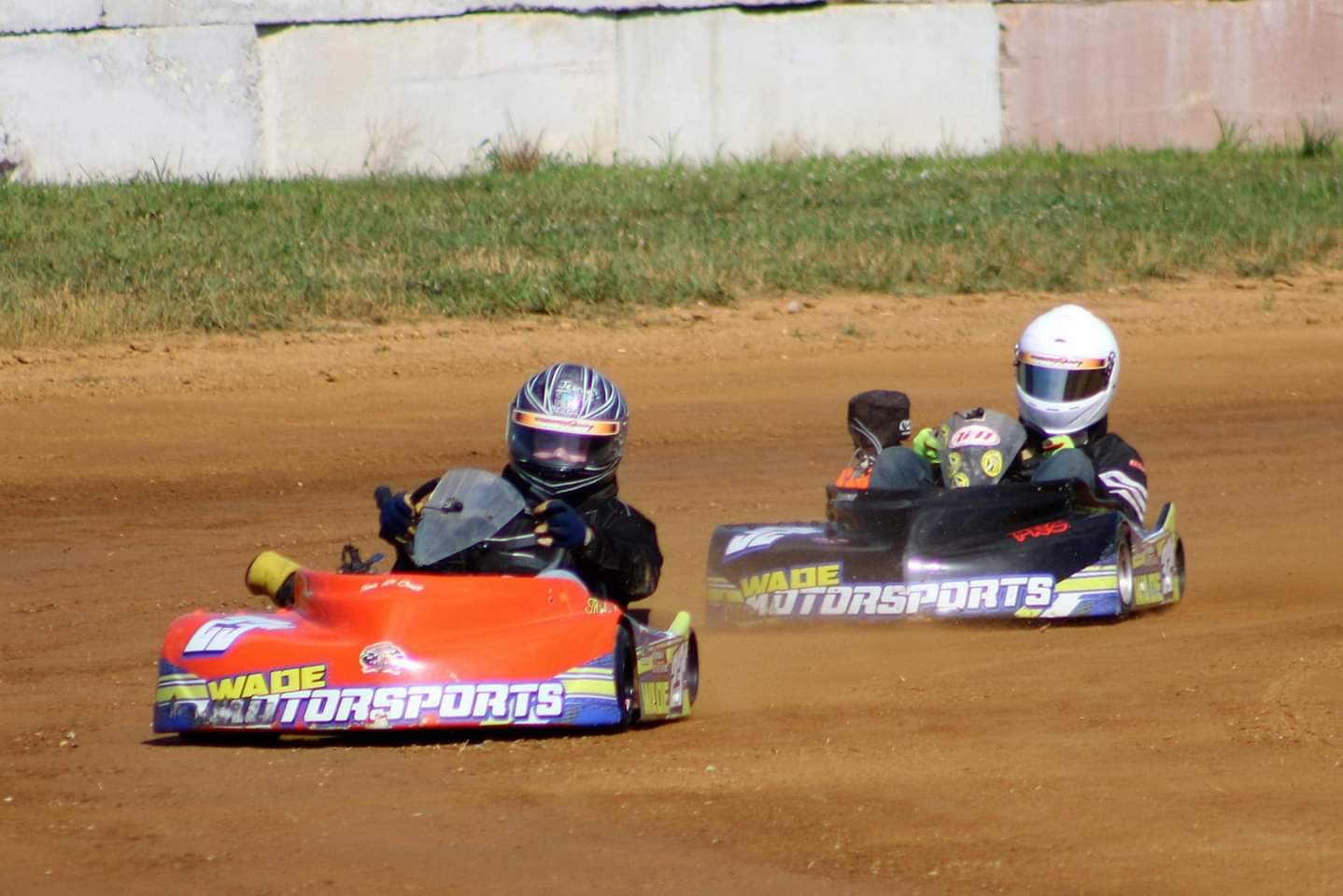 Jeremy wade in black kart and my son Michael wade in orange kart practicing for the races