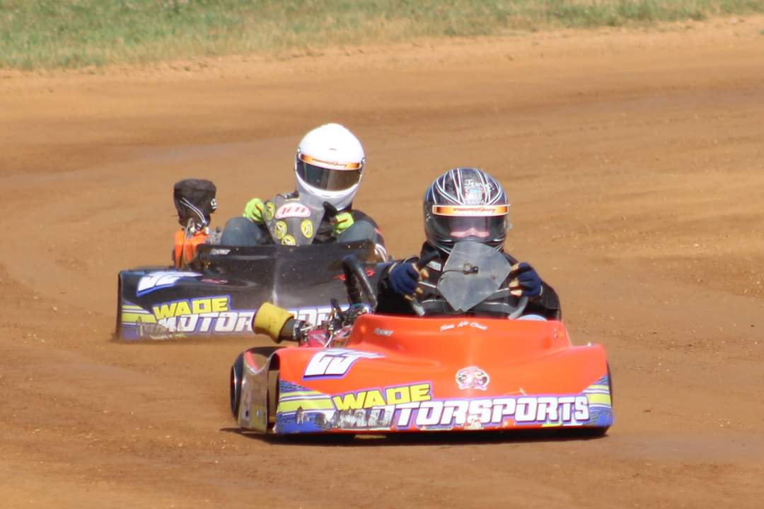 Jeremy wade in black kart and my son Michael wade in orange kart practicing for the races
