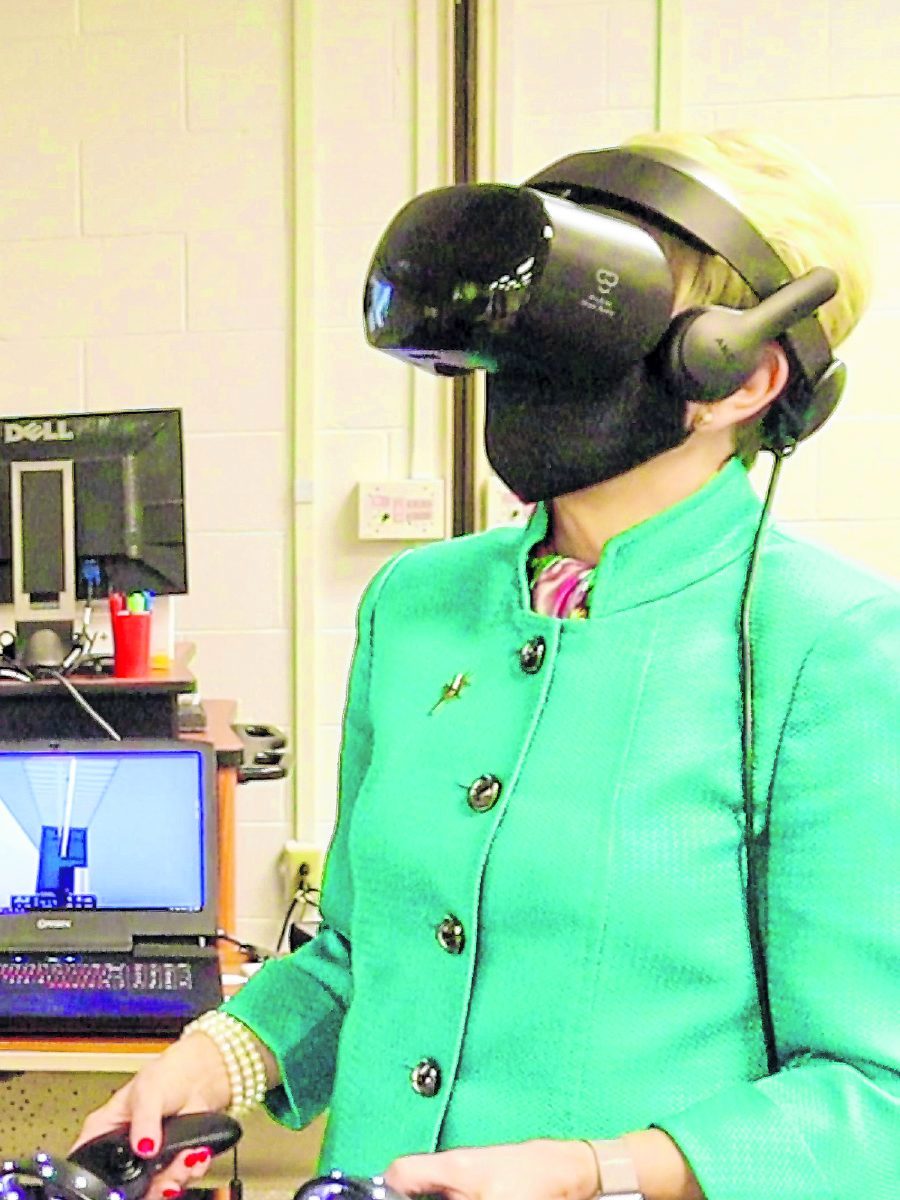 Ivy Tech President Sue Ellspermann experiences a virtual walkthrough of the new Ivy Tech - Columbus building as part of the video on the groundbreaking. Photo provided  Submitted photo