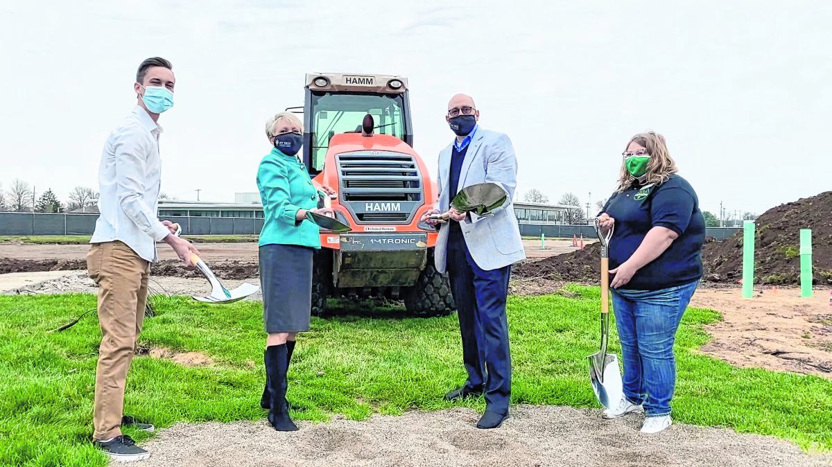 Ivy Tech student Jeffrey Hermann, left-right, Ivy Tech President Sue Ellspermann, Ivy Tech - Columbus Chancellor Steven Combs and Ivy Tech student Carleen Medsker prepare for the traditional shovel of dirt as part of the groundbreaking ceremony. Photo provided  Submitted photo