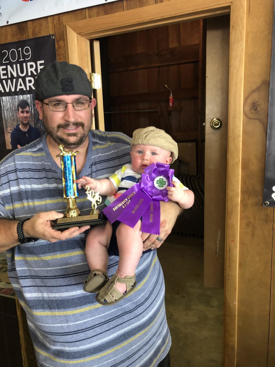 My husband Paul Quillen with our son Jasper Quillen, who won 1st place in the 3-6 month old baby personality contest. Photo taken by Belinda Quillen