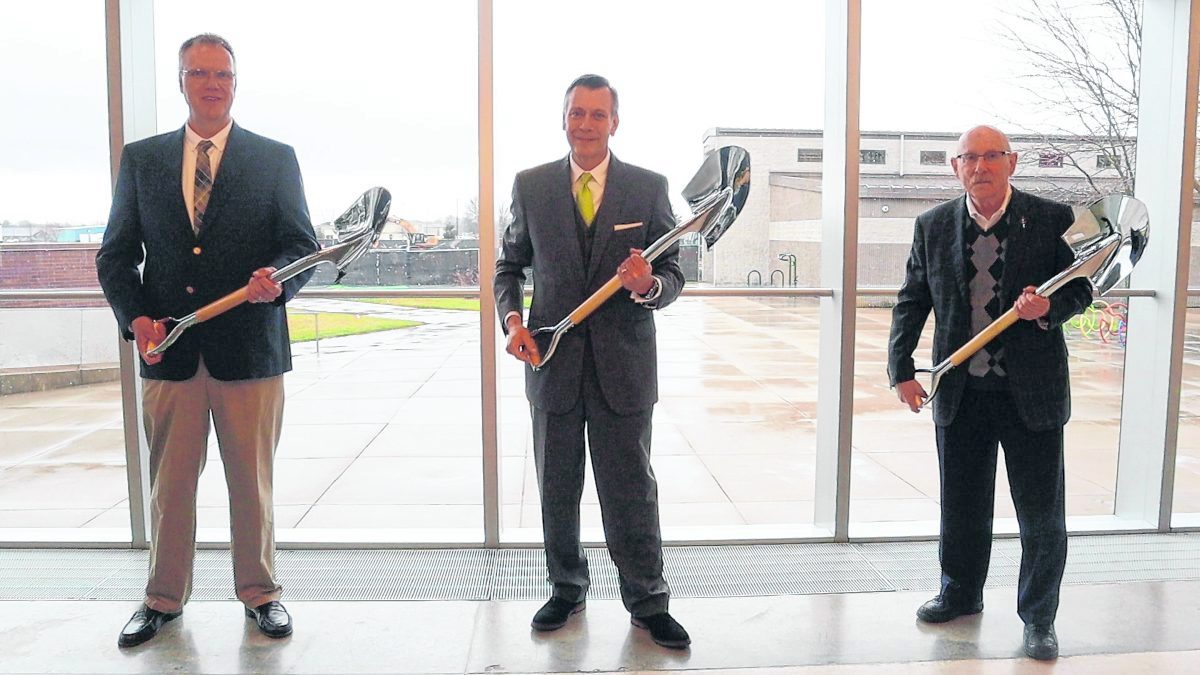 Richard Beckort, Ivy Tech - Columbus campus board of trustees chairman, Terry Anker, Ivy Tech state board of trustees chairman and Jesse Brand, state board of trustees member, hold ceremonial shovels in the video about the groundbreaking. Photo provided  Submitted photo