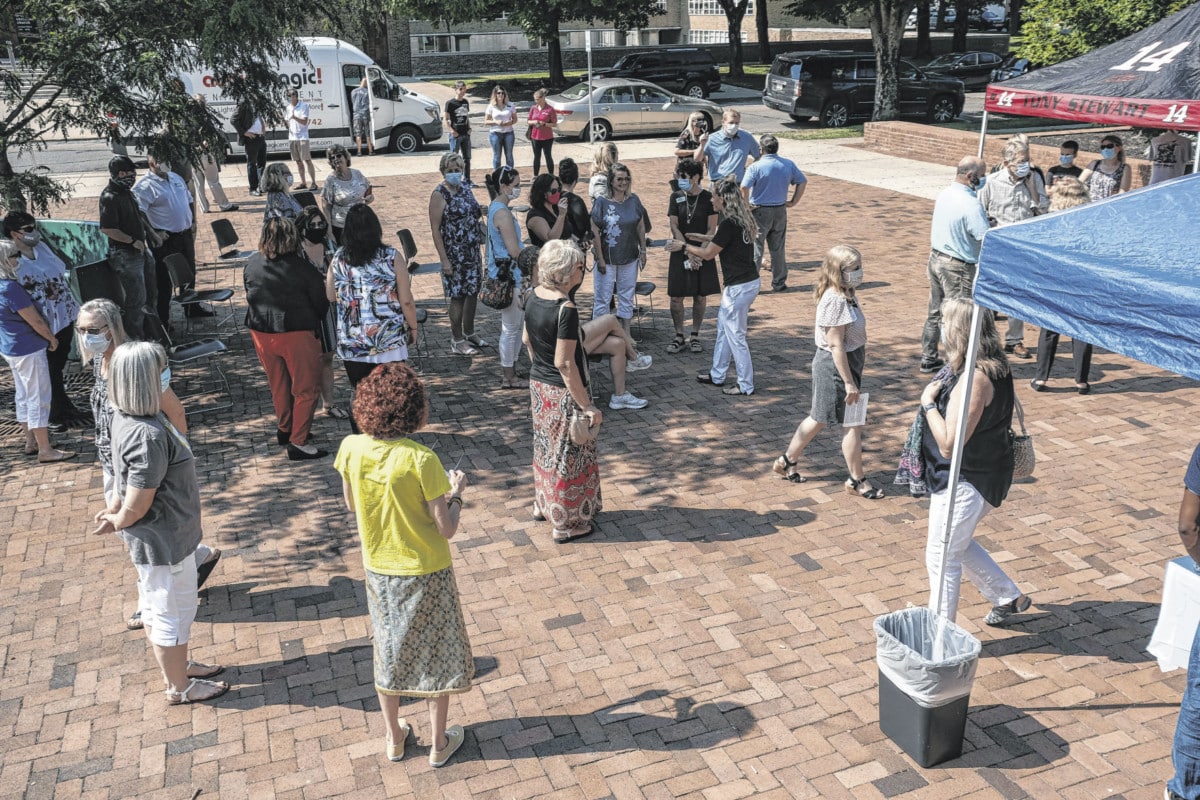 Local residents gather for a dedication of a new Blessing Box on the Bartholomew County Library Plaza, provided as a gift as the Tony Stewart Foundation becomes part of the Columbus Area Chamber of Commerce. Photo by Mike Wolanin | All rights reserved