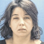 Flatrock woman arrested after burglary reported