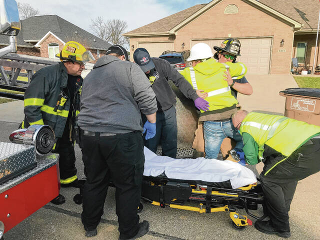 127974551_web1_20220114cr-worker-rescue-3