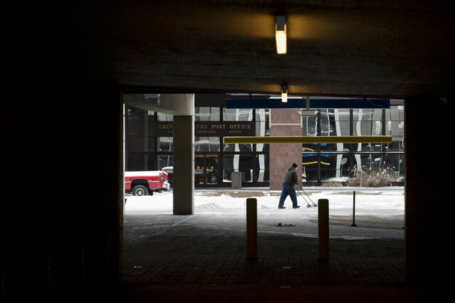 128112809_web1_20220206cr-downtown-parking