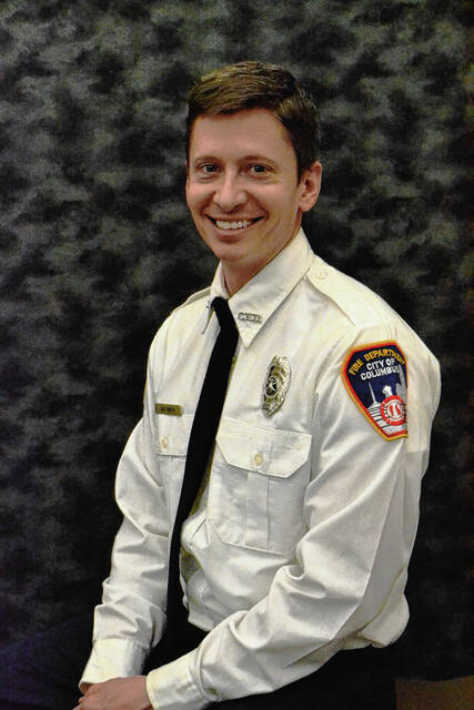 128139808_web1_Lt-Dan-Smith