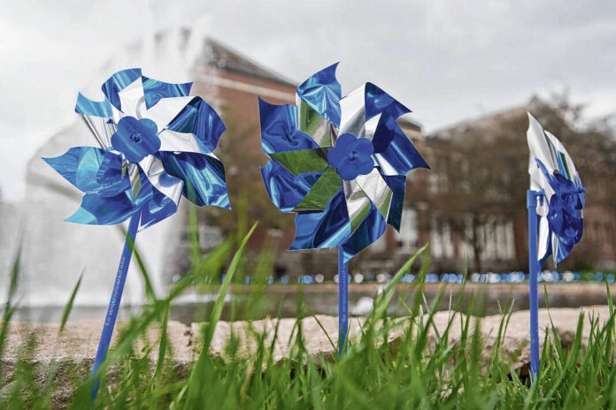 128460044_web1_20220326cr-pinwheels