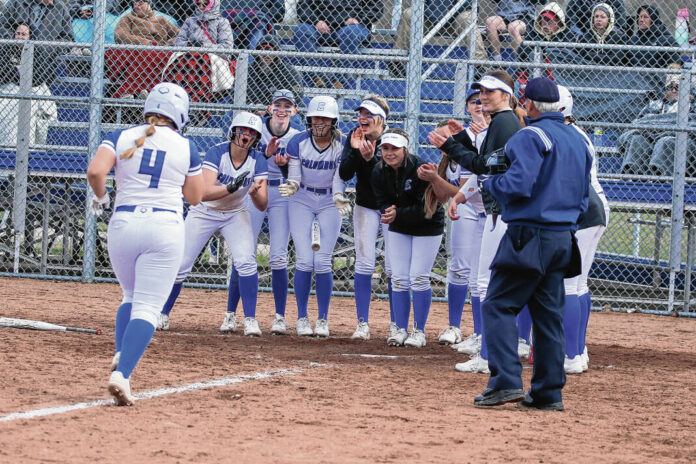 128561898_web1_20220408cr-north-softball-9120