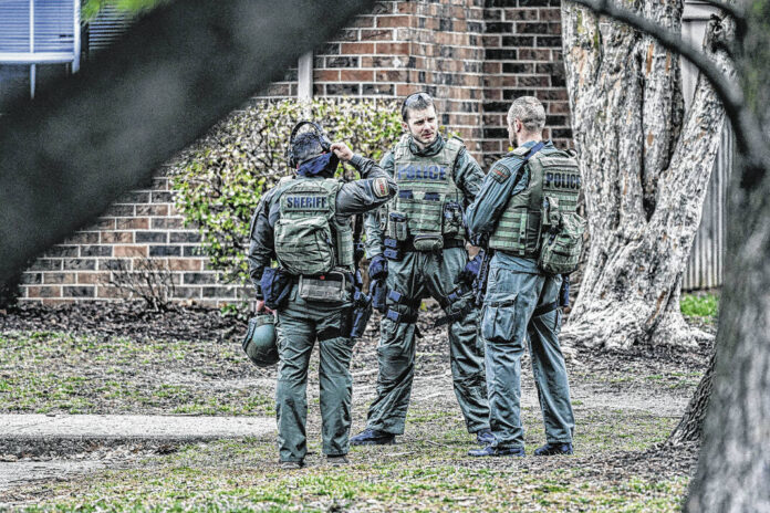 128990555_web1_20220605cr-swat-team-3