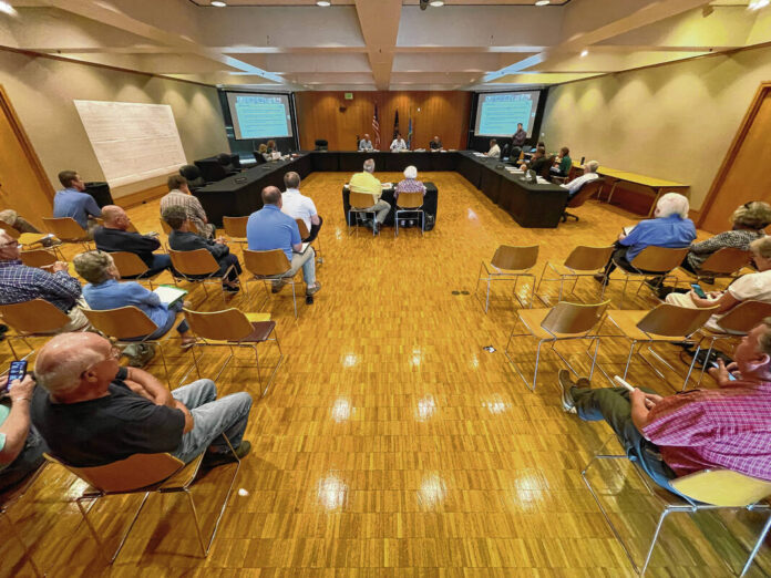 129025632_web1_20220609cr-solar-hearing