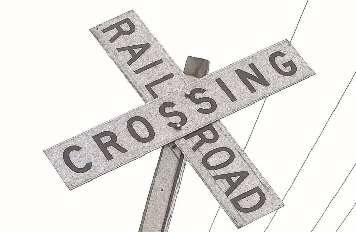 131451503_web1_railroad-cossing