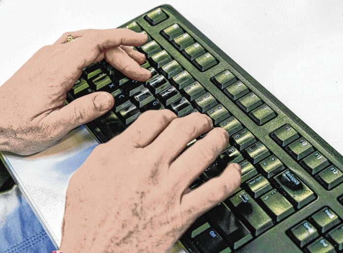 131516354_web1_20220114cr-typing-around-town-illustration