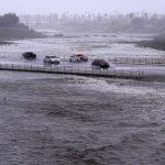 Rain from Tropical Storm Hilary lashes California and Mexico, swamping roads and trapping cars
