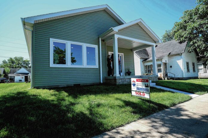 131953582_web1_20230913cr-homebuyer-ribbon-cutting-6