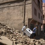 Moroccan soldiers and aid teams battle to reach remote, quake-hit towns as toll rises past 2,400