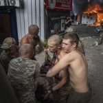 Russian missile turns Ukrainian market into fiery, blackened ruin strewn with bodies