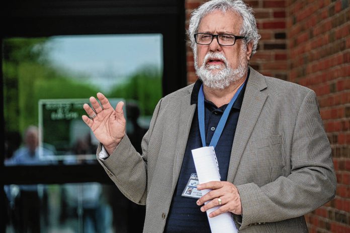 132180443_web1_20230421cr-utilities-ribbon-cutting-4