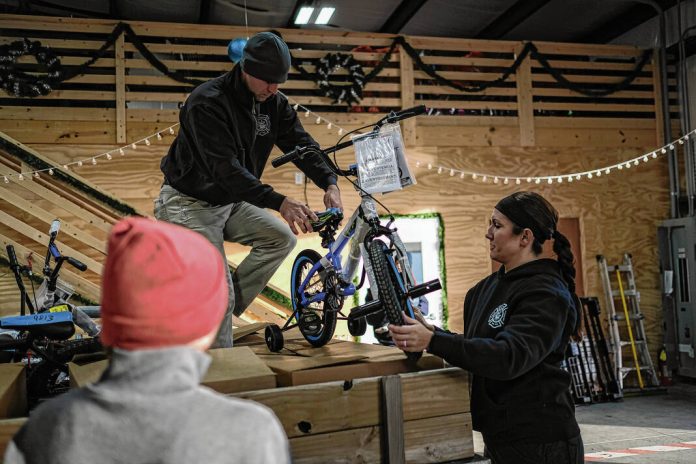 132461908_web1_20231216cr-cheer-fund-delivery-29