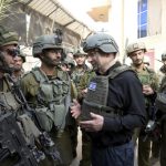 Live updates | Israel’s forces raid a West Bank refugee camp as its military expands Gaza offensive