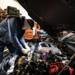 US employers add a solid 199,000 jobs and unemployment falls, signaling a still-sturdy labor market