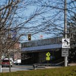 Divided city council votes to buy former downtown Sears building