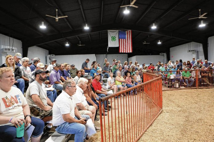 133390478_web1_20240630cr-fair-livestock-auction-2