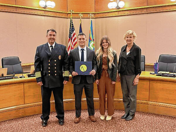 133914807_web1_20241026cr-neighbors-firefighter