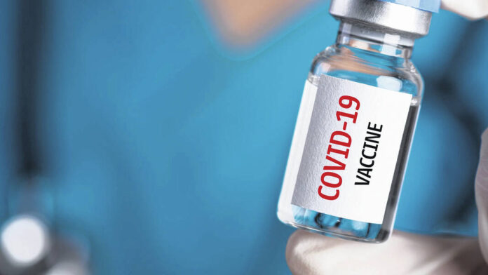 134862430_web1_covid-vaccine-photo