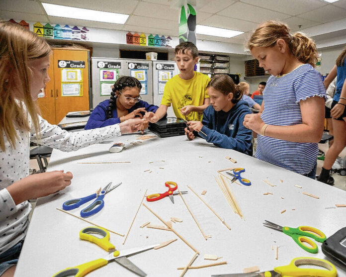 135151409_web1_20250806cr-EC-Lincoln-STEM-Model-Building_030