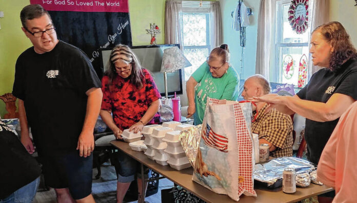 135474330_web1_20251011cr-shareamealprogram1