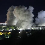 Stragglers from Myanmar scam center raided by army cross into Thailand as buildings are blown up