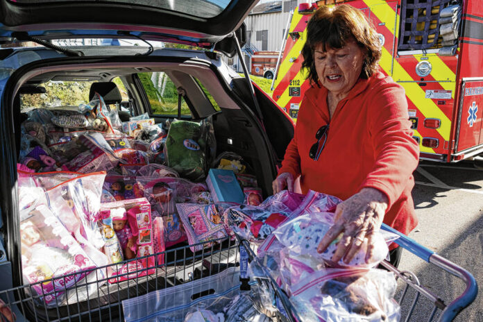 135620158_web1_20251108cr-cheer-fund-dolls-1