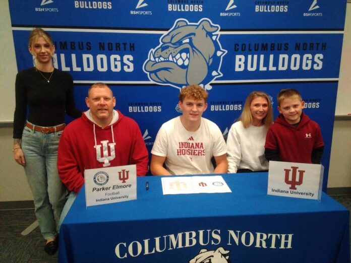 135738725_web1_20251204cr-elmore-signing-1