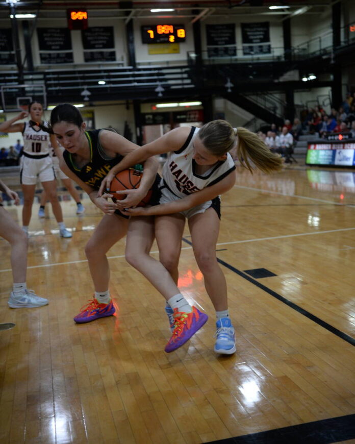 135751268_web1_20251210cr-hauser-girls-bb-008