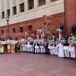 Indian unions and farmers stage a nationwide strike over interim trade deal with US